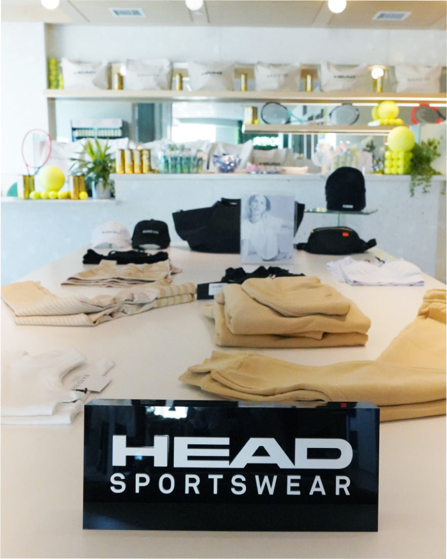 Head Sportswear product on a table at the LA Bandier store
