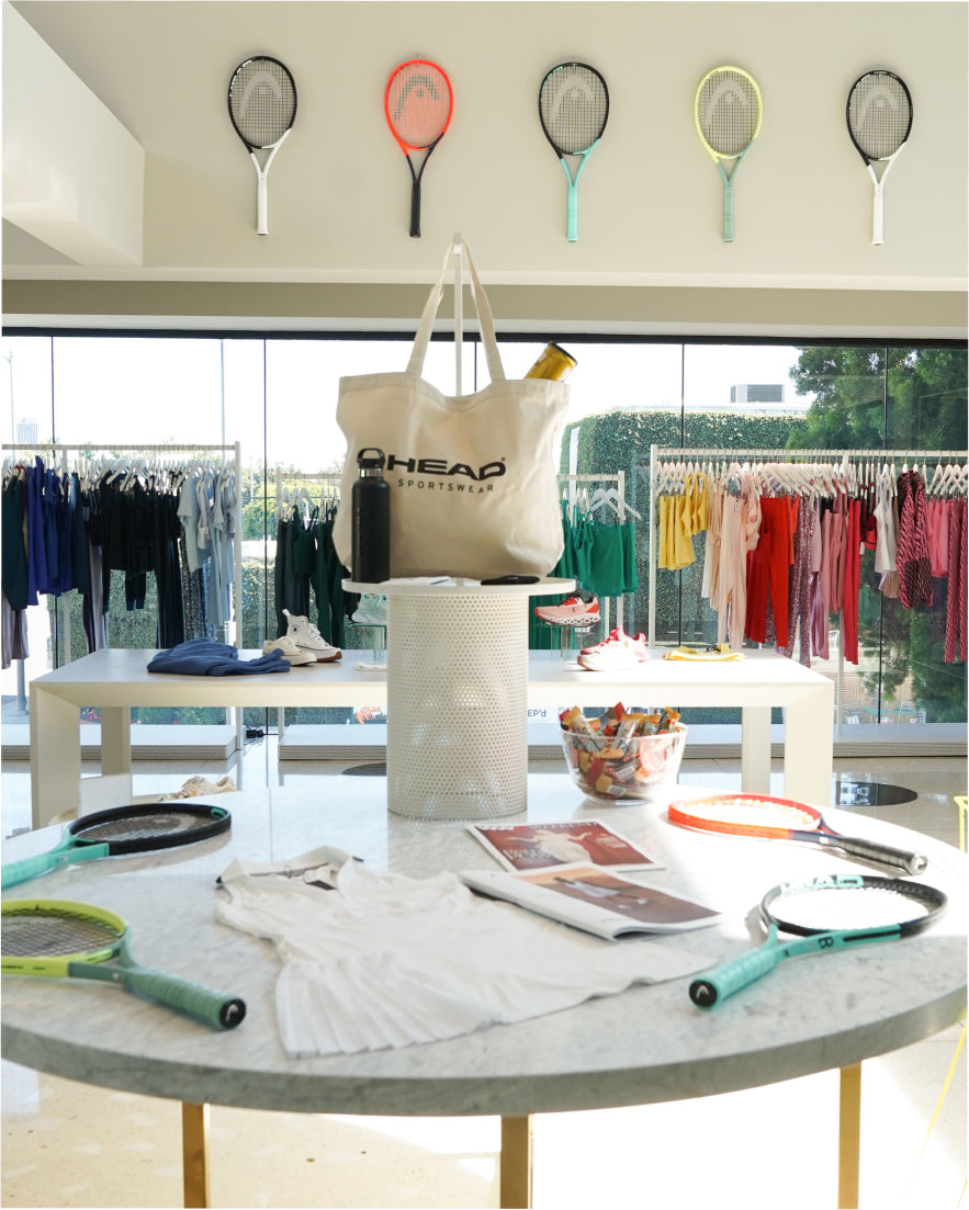 Head Sportswear tennis rackets on a table at the LA Bandier store