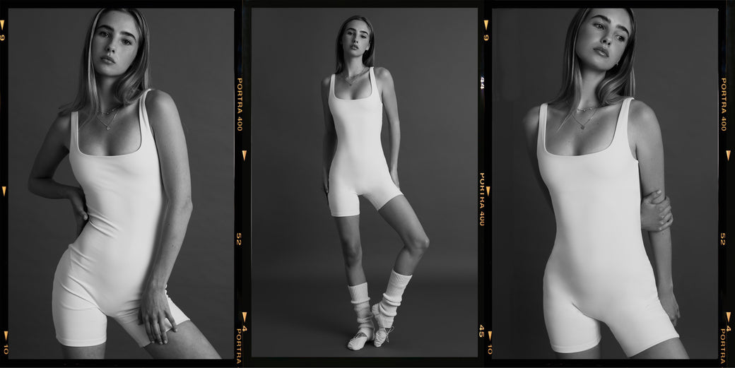 Three black and white photos of a model wearing a white bodysuit from Le Ore styled with ballet slippers